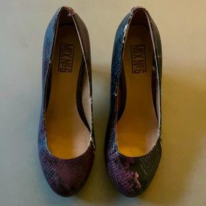 Kitten-heeled, purple snakeskin.